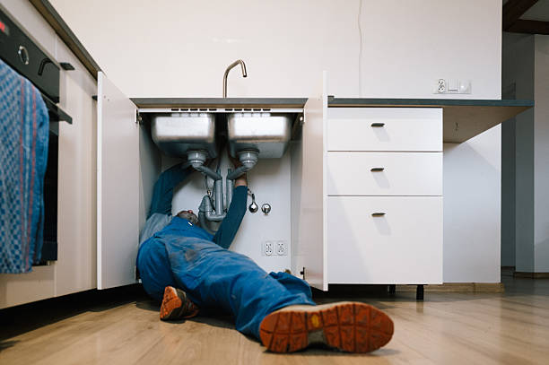 Professional Drain Cleaning technician working in Ekron, KY